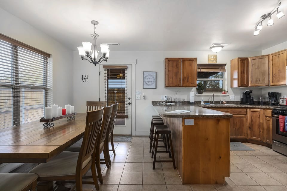Dining room with table and bar seating