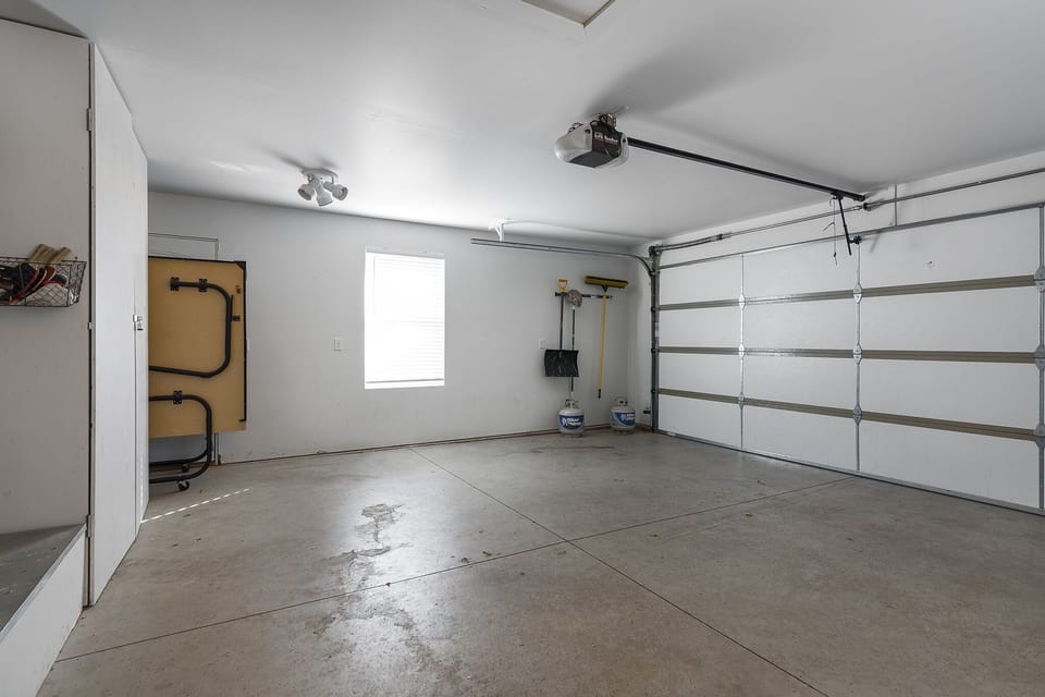large 2 car garage with ping pong table