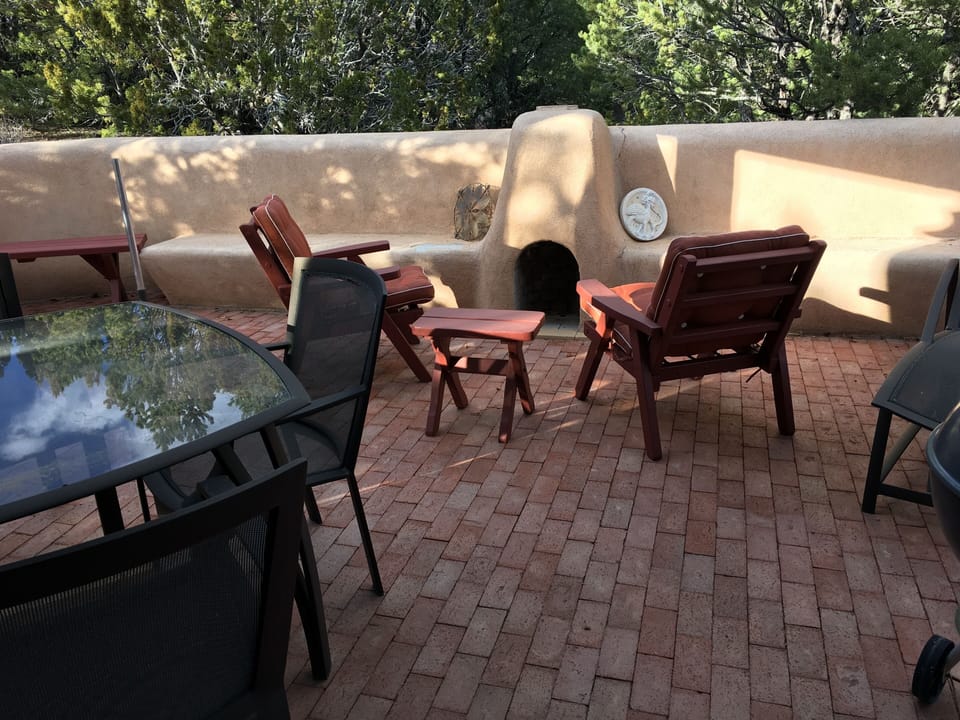 Kiva fireplace in outdoor patio - especially nice on cool evenings