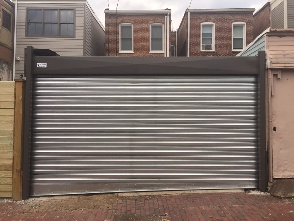 Garage door and private parking.