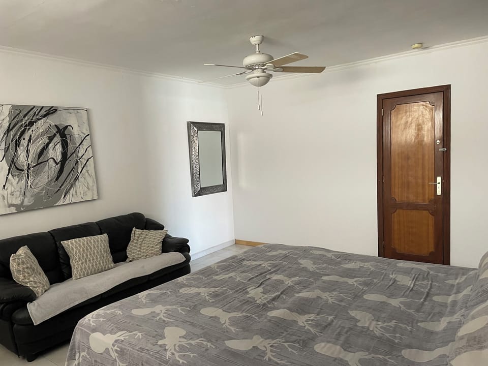 Large bedroom with continental sized bed and memory foam mattress