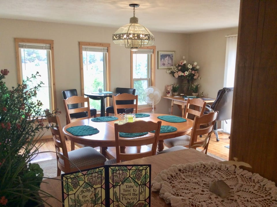 Large dining room with windows to view wildlife