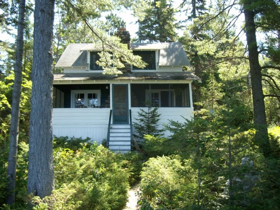 Lake side of 1925 cottage showing porch