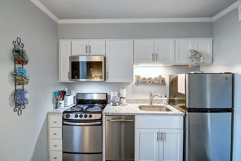 Kitchen - This small kitchen is designed for delightful meal preparation during your perfect getaway