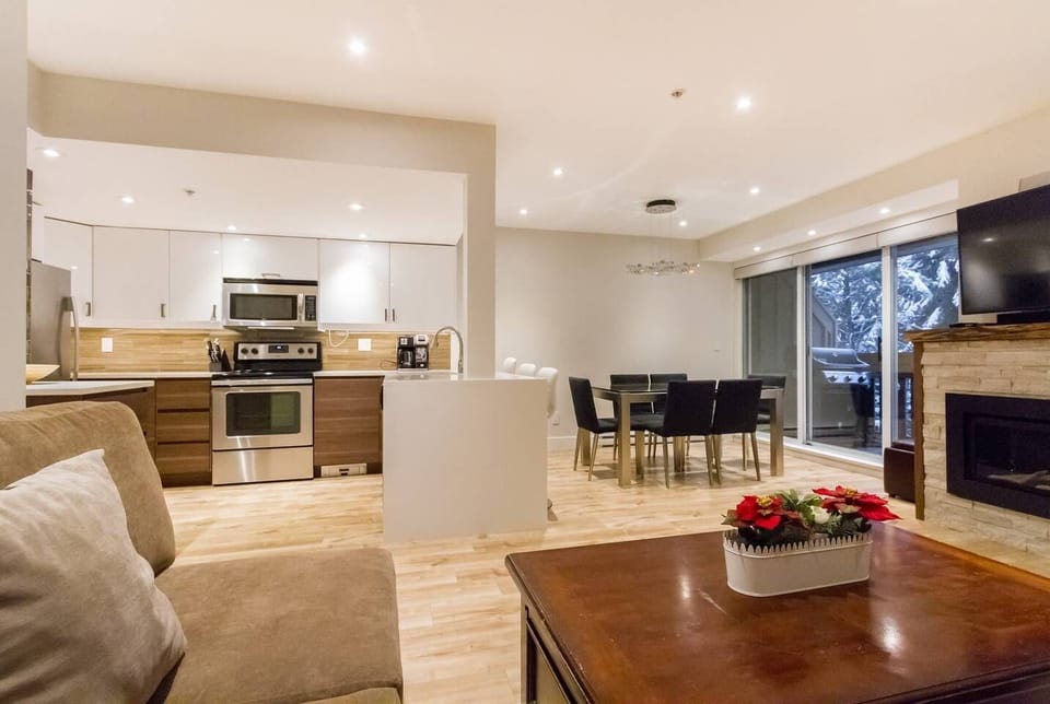 Open floor plan showing kitchen, dining and living area