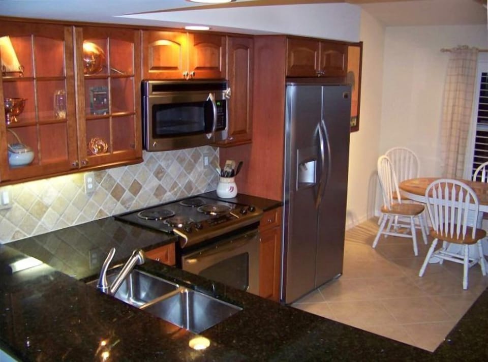 EAT-IN KITCHEN AND BAR (custom cabinetry and appliances)