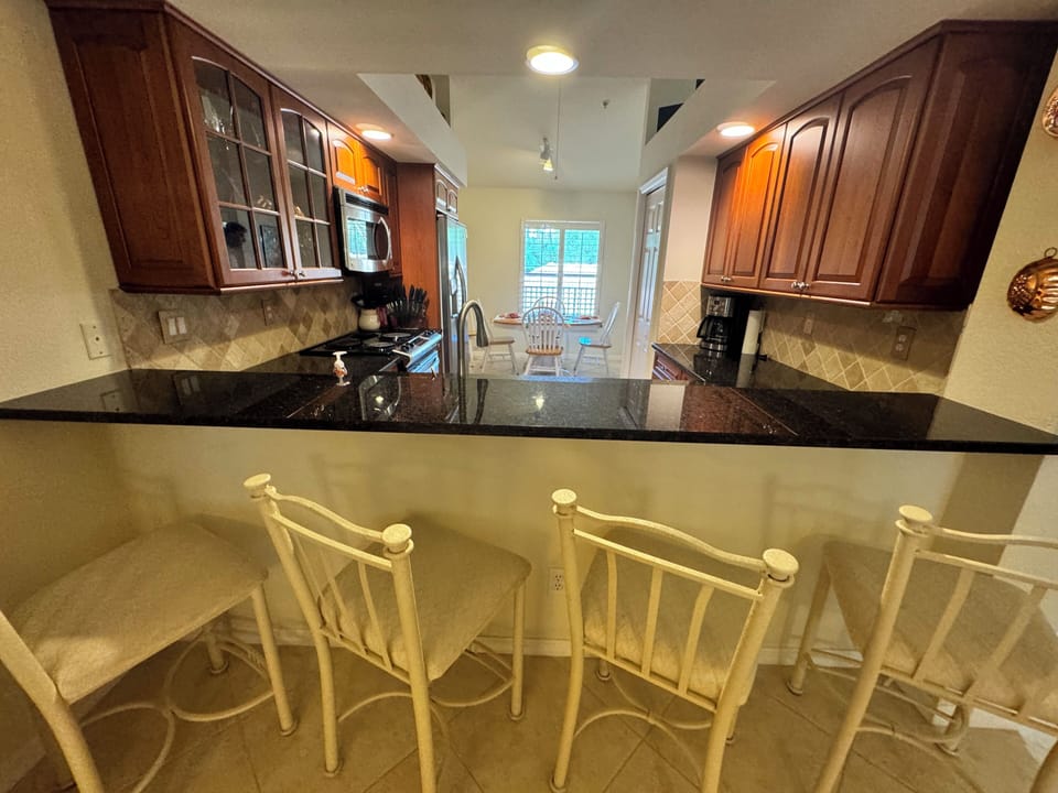 Optional Bar Dining or Eat-in-Kitchen with Table and Chairs