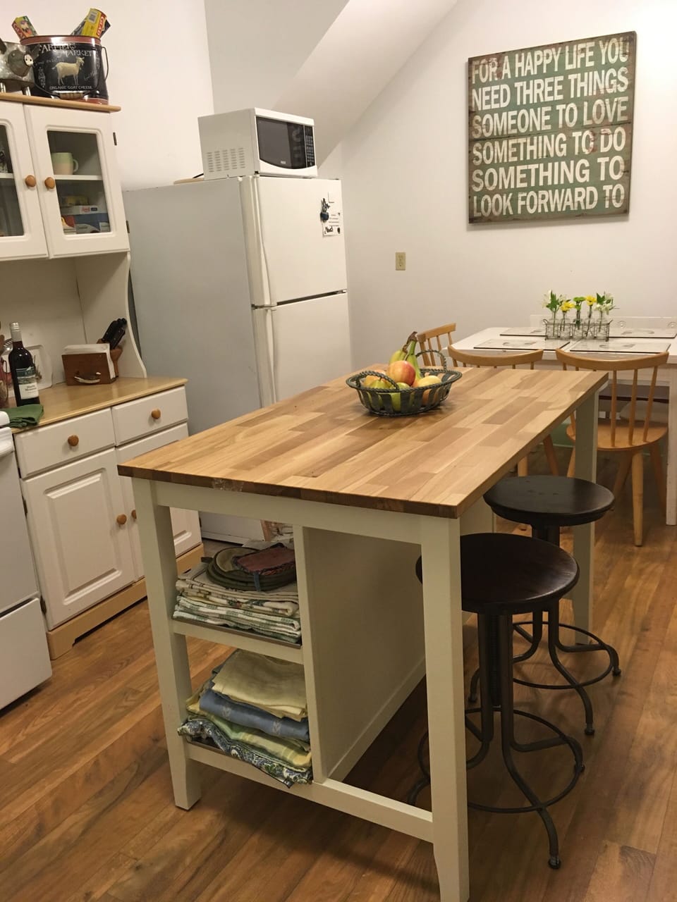 Open concept kitchen with multi-purpose island