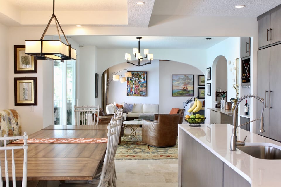 View from kitchen to cocktail  seating