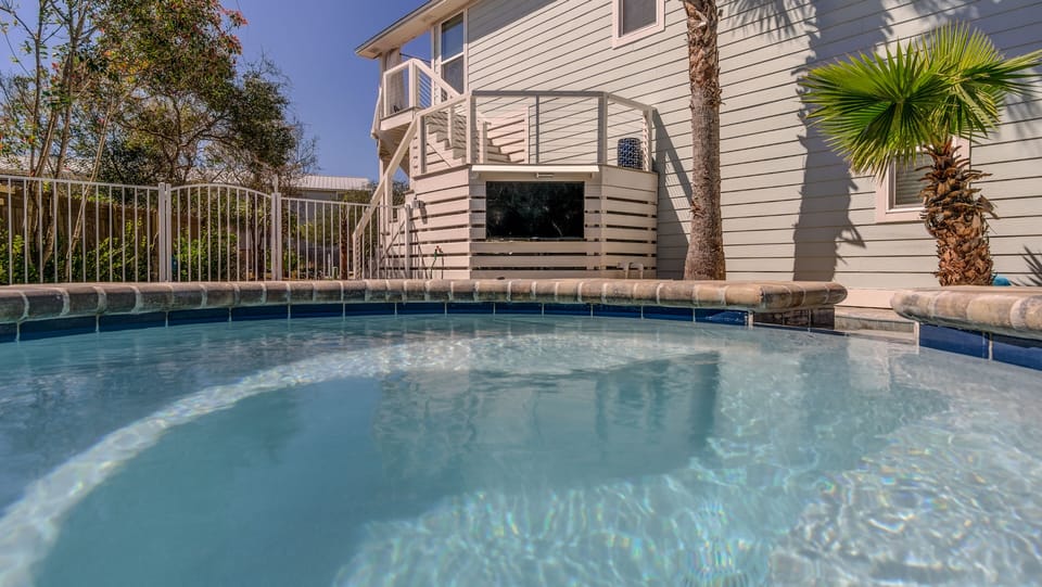 Enjoy the game from the hot tub or pool