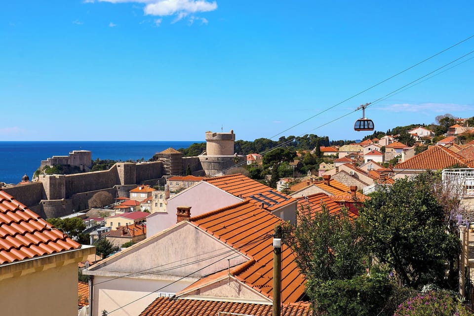 Enjoy the iconic postcard view of Dubrovnik, with the historic Old Town walls and the sparkling Adriatic Sea stretching before you.
