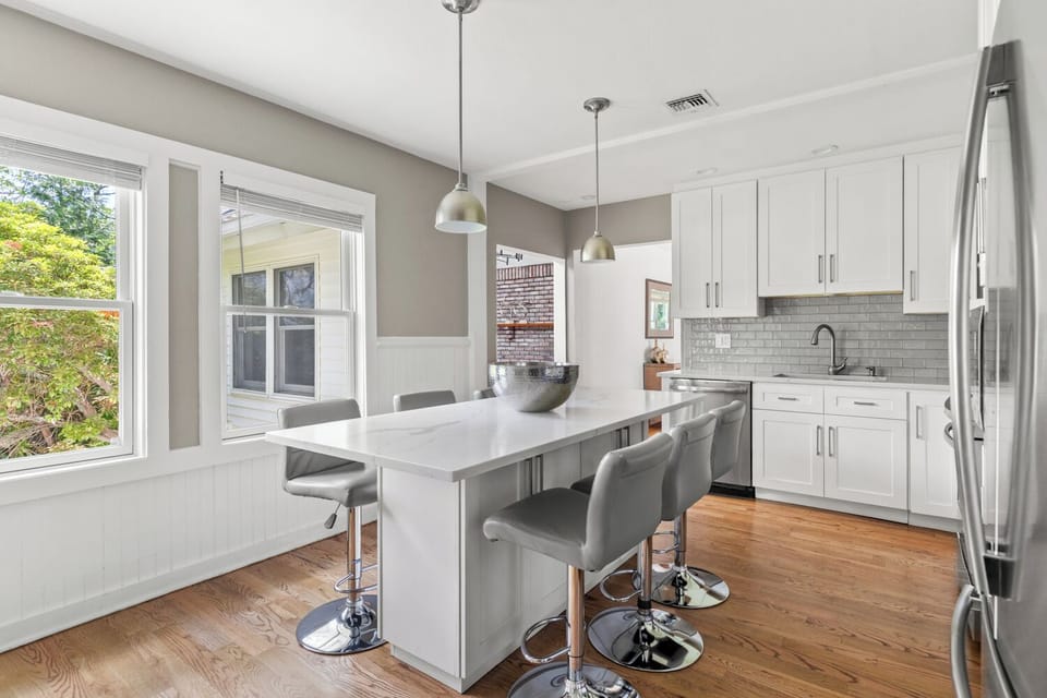 Bright airy kitchen perfect for gathering and entertaining