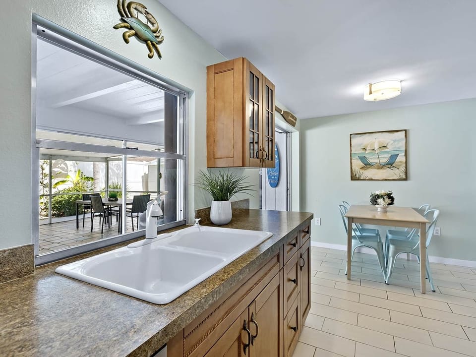 Kitchen sink with pass thru