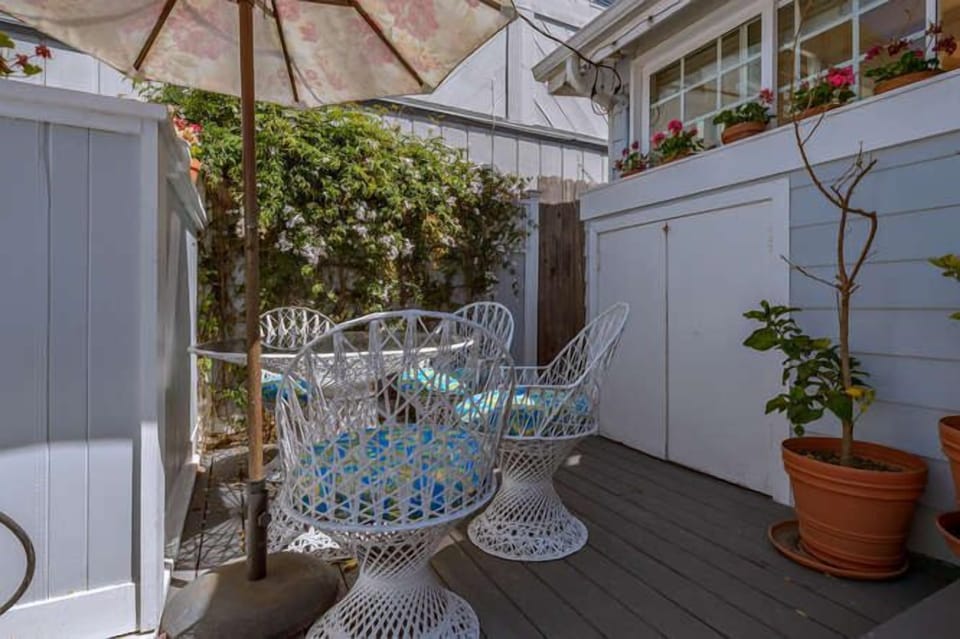 Outdoor eating and BBQ area shared with other cottage
