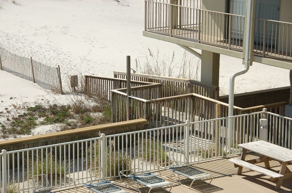 Walkway to Beach by the Pool under our four story building