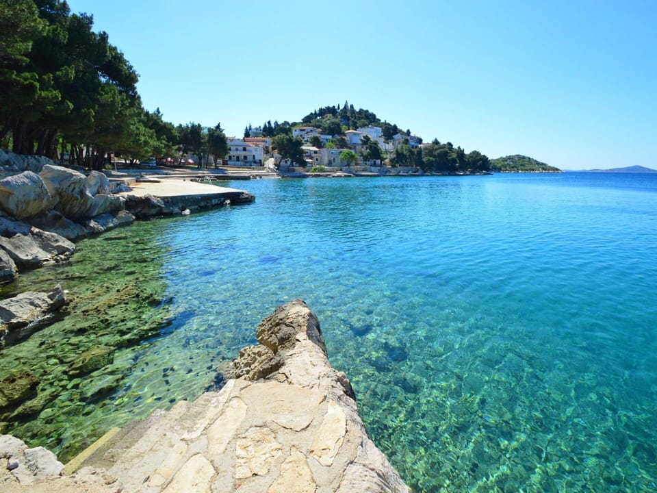 Water, Sky, Cloud, Water Resources, Azure, Tree, Natural Landscape, Beach, Coastal And Oceanic Landforms, Plant