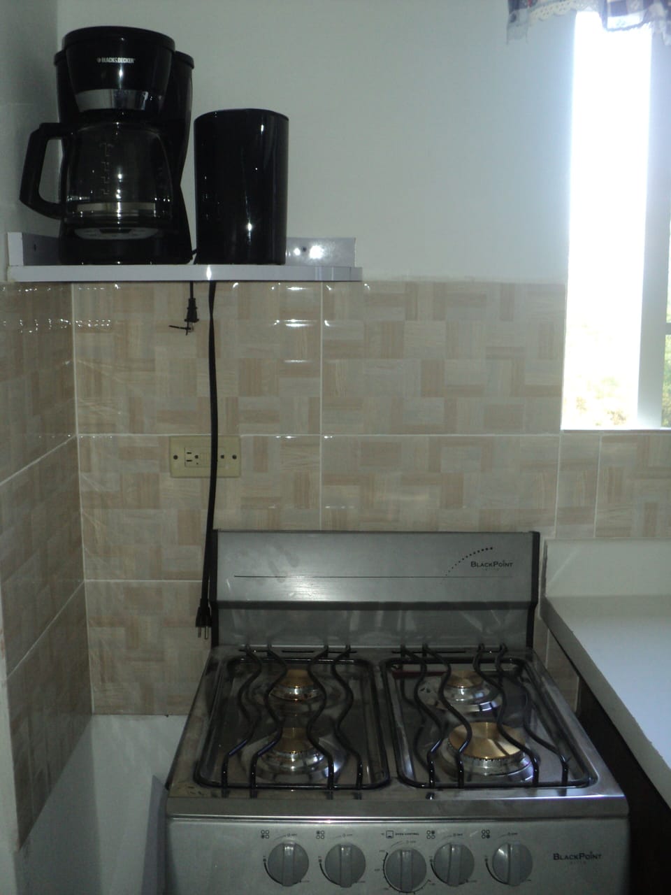 Stove with oven, coffee maker and kettle 