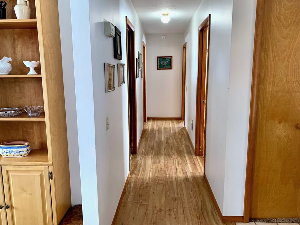 Hall to the main bathroom and the bedrooms.