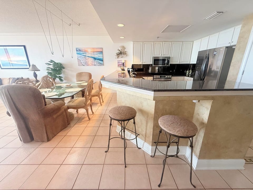 Bar seating overlooking the kitchen
