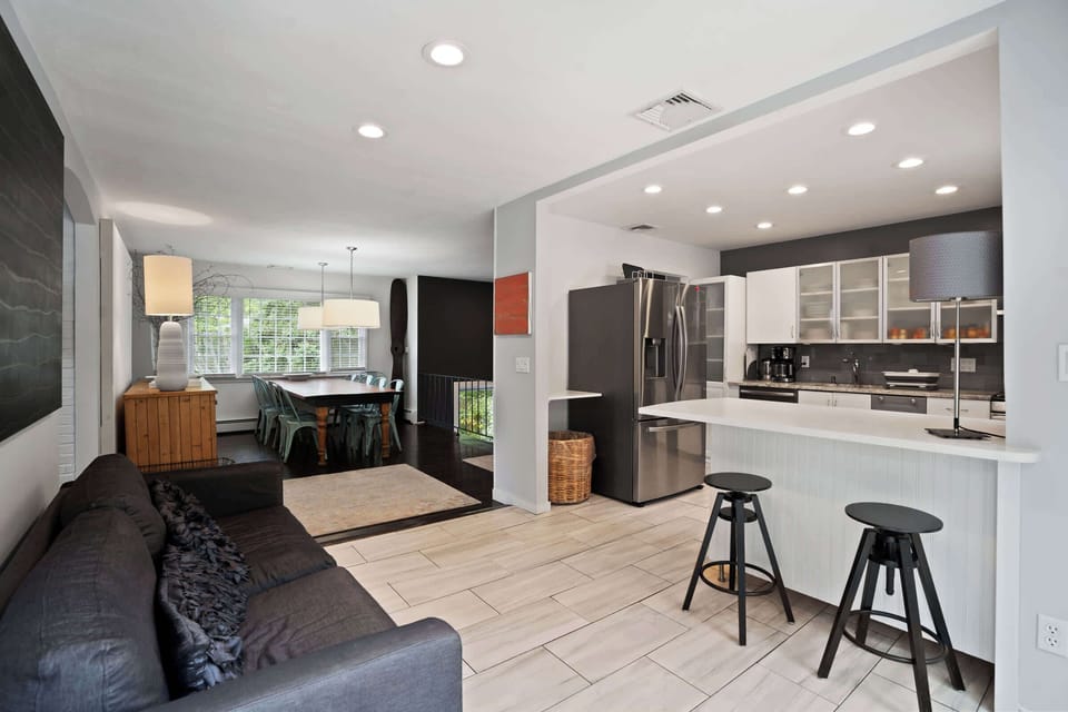 Open living, dining, and kitchen flow