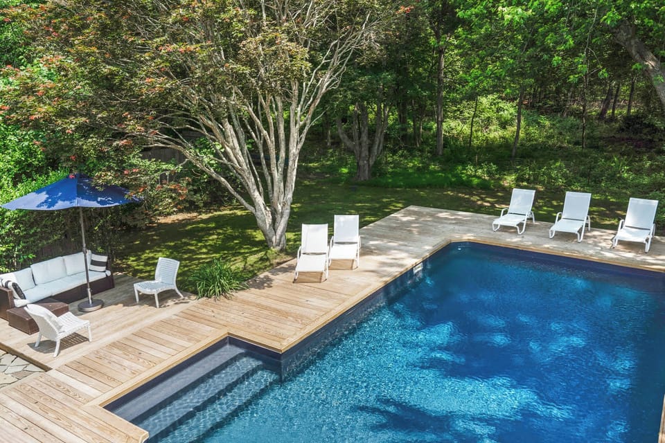 Pool surrounded by mature trees