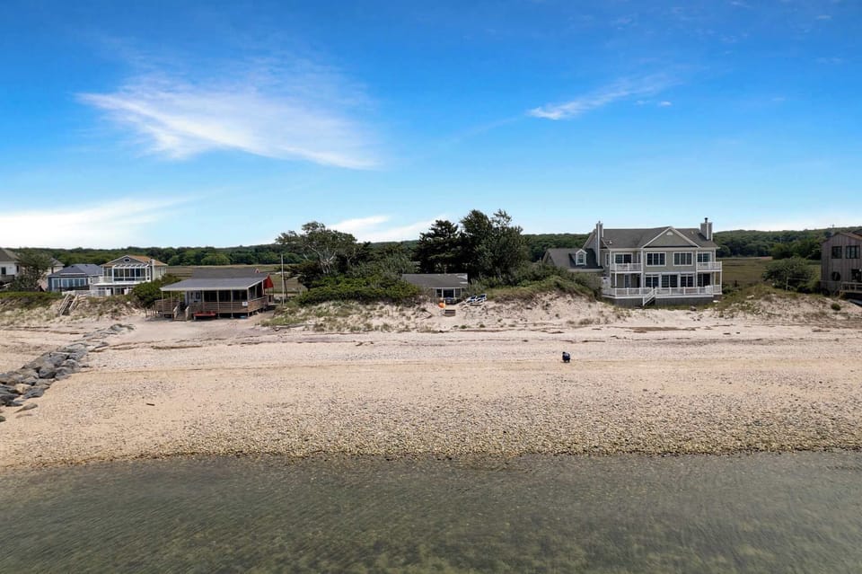 Aerial showing cottage among neighbors