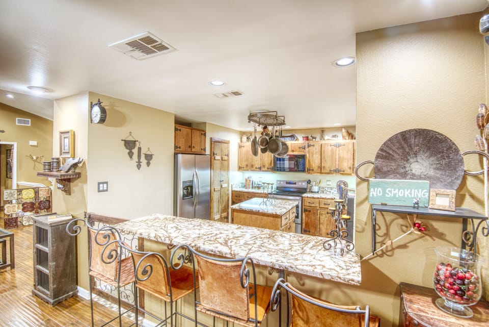 Prepare a drink and snack in open entertaining area