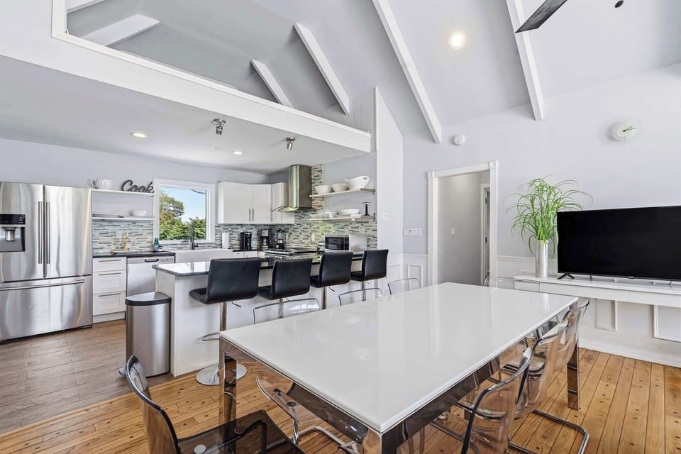 Kitchen with island bar and dining for 8