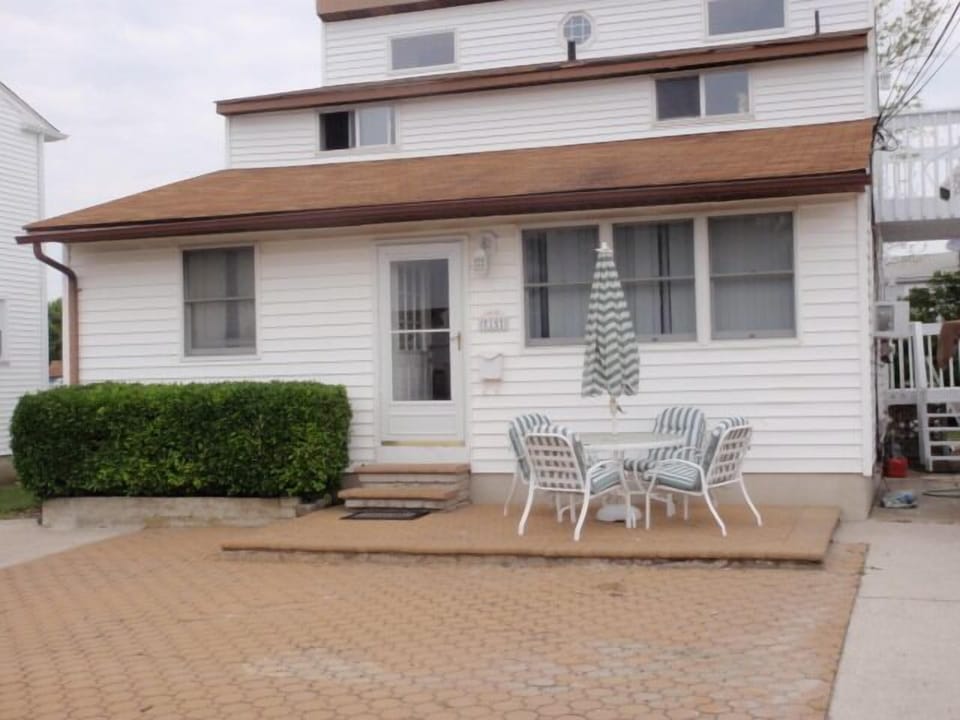 front property with patio and grill 