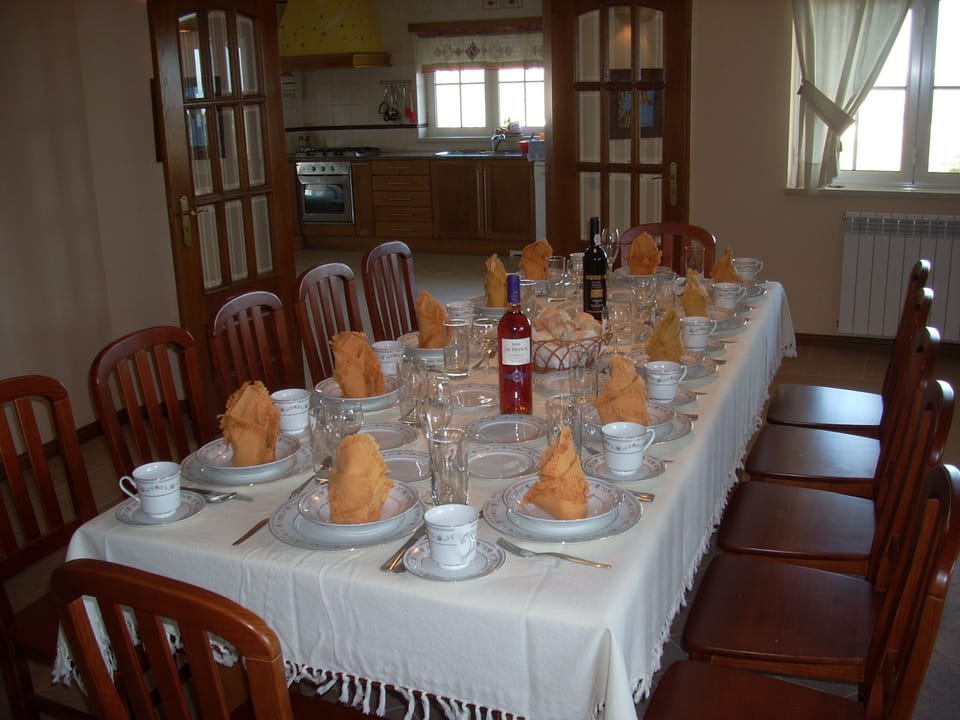 Dining area set for formal dinner