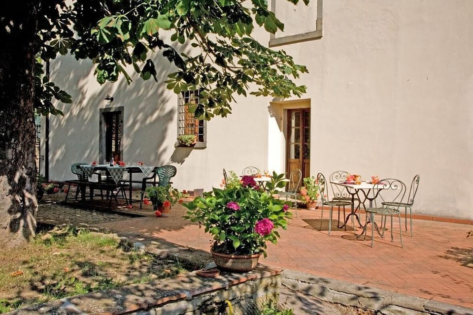 Terrace with large tables and ping pong