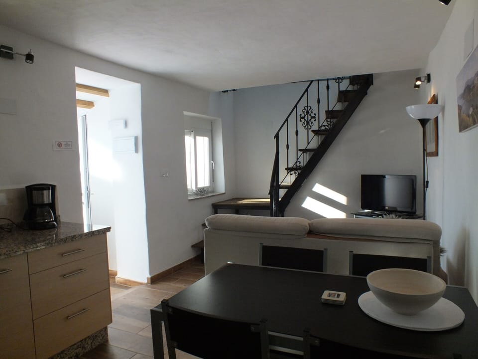 Stairs up to master bedroom and roof terrace.