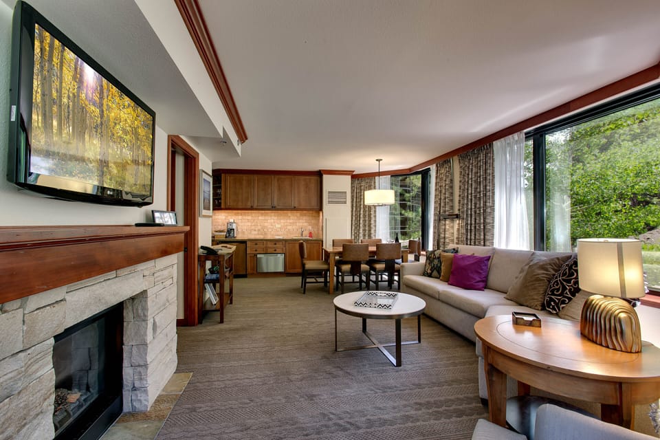 Kitchen dining, living rm w/ a stone fireplace. So much room. Newly Remodeled! 