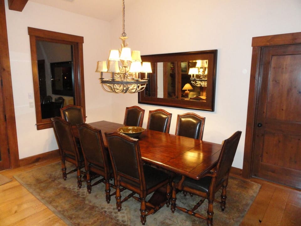 Dining table seats 8, plus 2 at game table, and 4 at the bar.