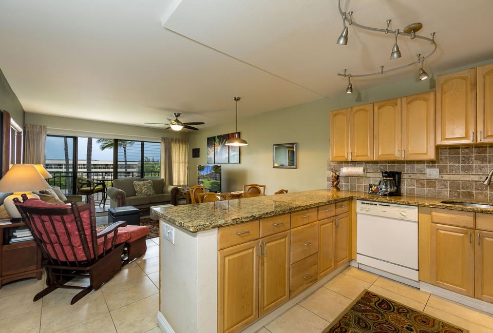 Full kitchen with dishwasher, oven/stove, microwave, fridge and garbage disposal