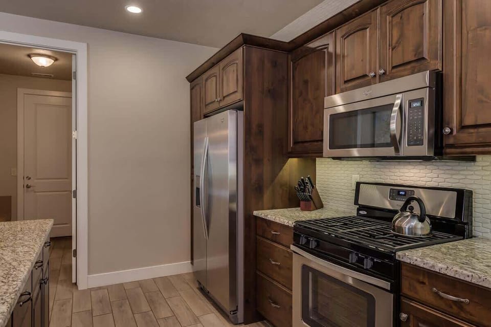 Enjoy preparing meals on deluxe stainless steel appliances