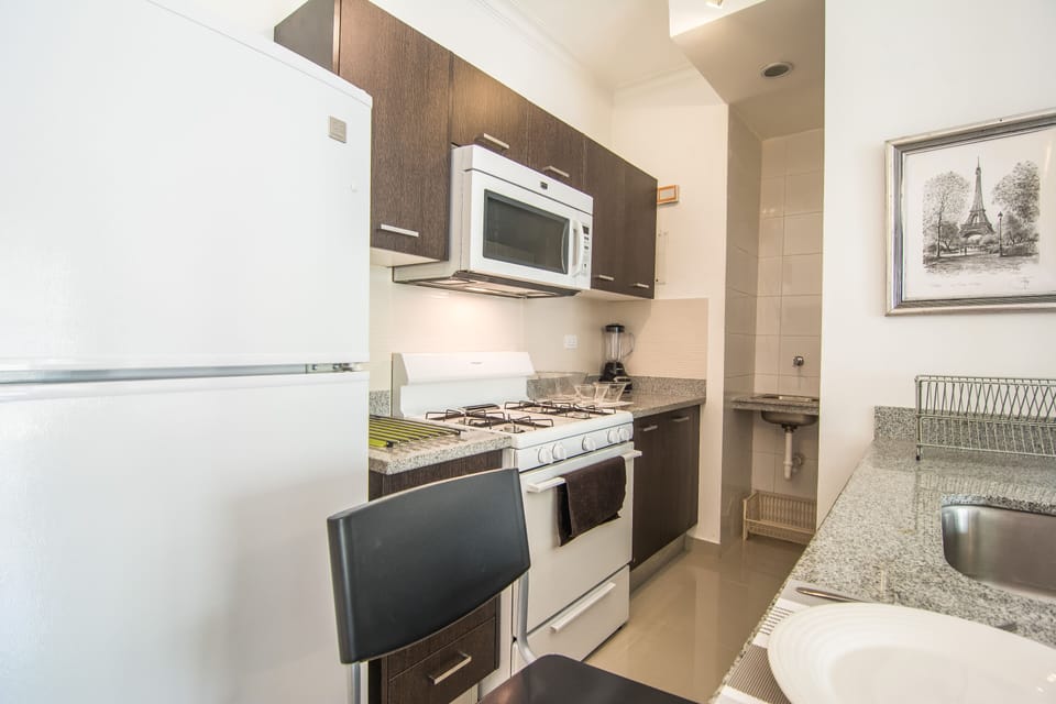 The Livingroom comes with an Open Fully Equipped Kitchen, Sofabed, TV + Cable, W