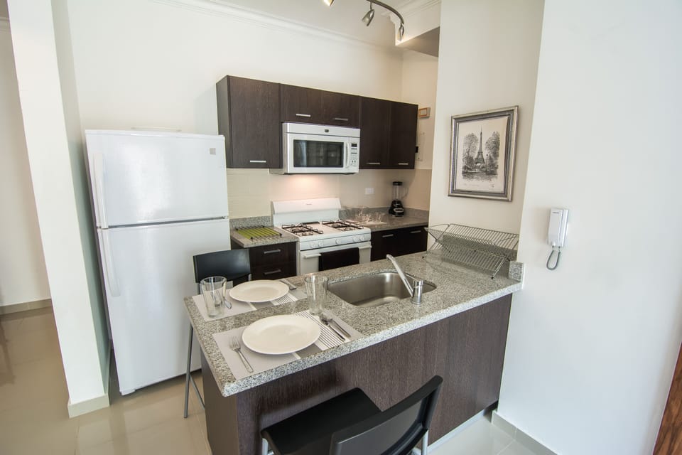 The Livingroom comes with an Open Fully Equipped Kitchen, Sofabed, TV and WIFI
