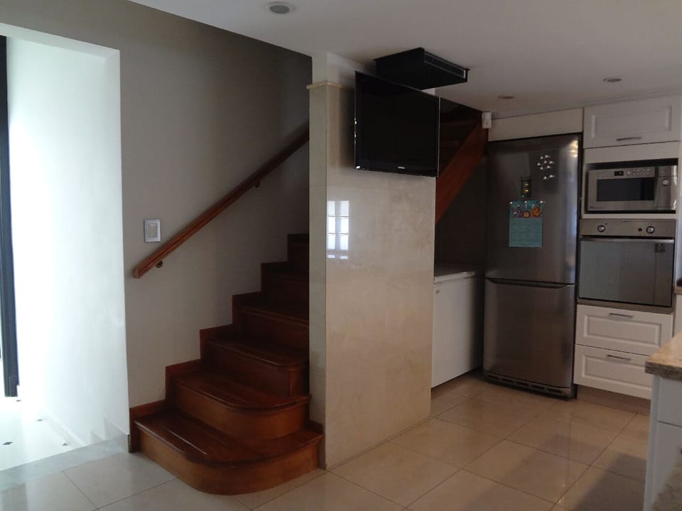 Kitchen (Pic #3) - Stairs to Bedroom 4 and to the Laundry