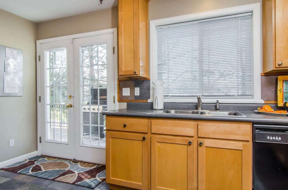 Kitchen with door to deck