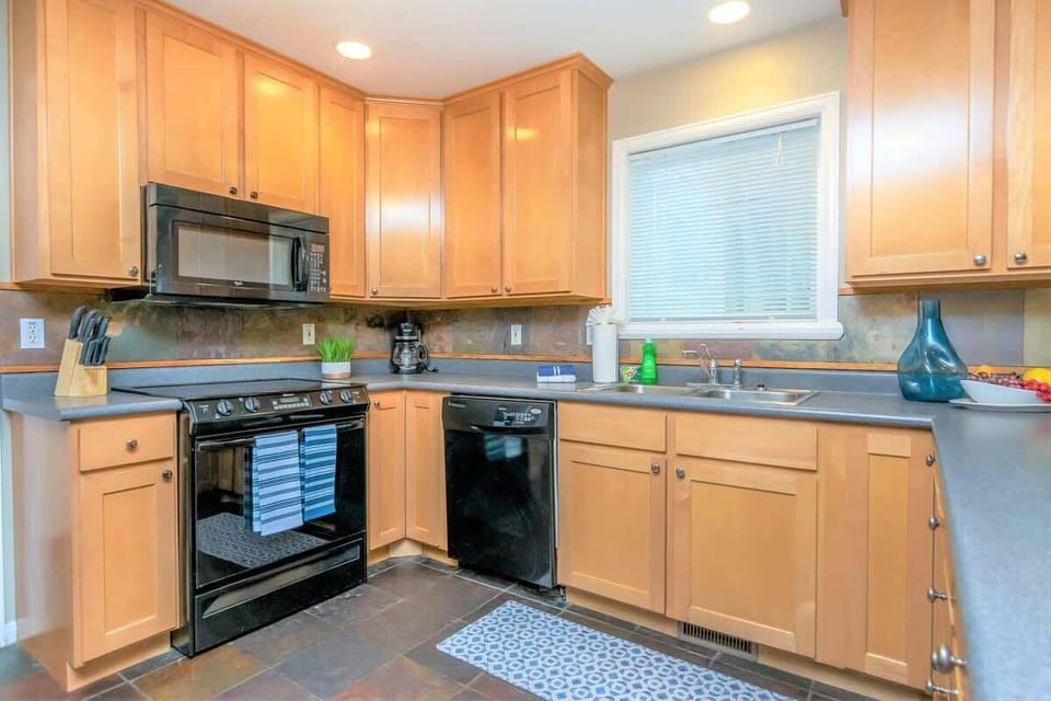Kitchen with dishwasher and supplies