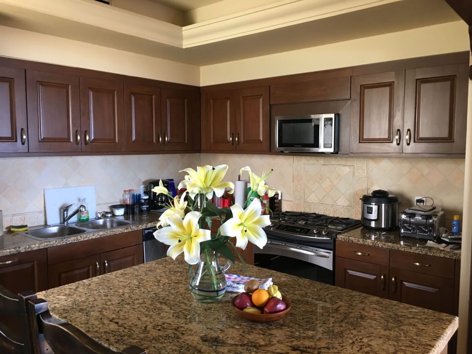 Large Kitchen with granite island (seats 2), Stainless appliances & full utensil