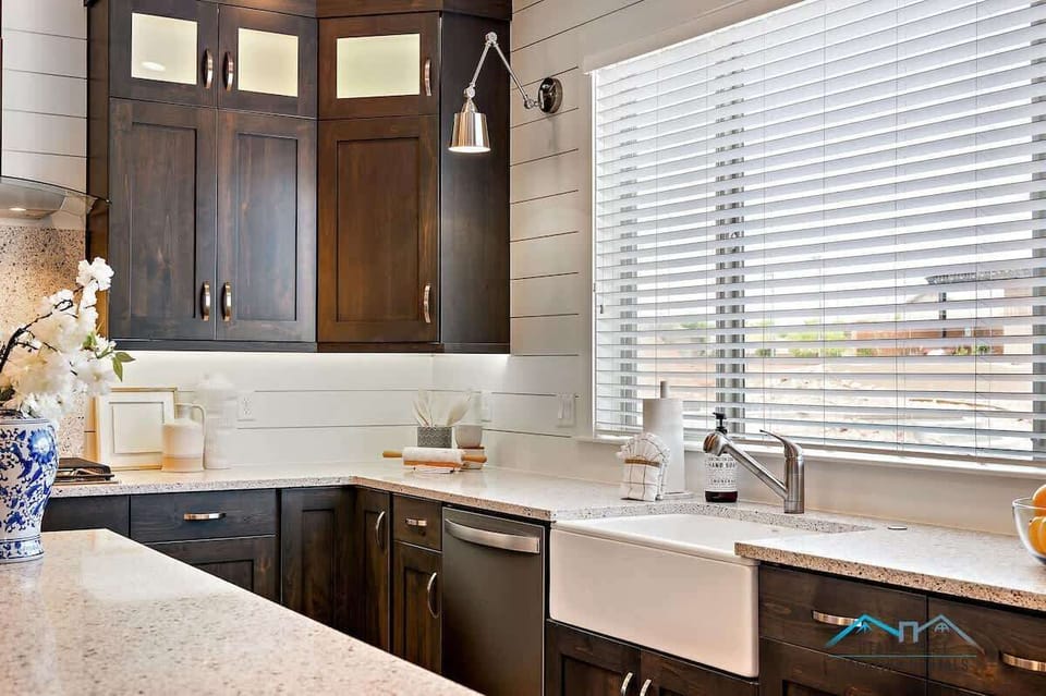 Modern kitchen with farm sink and island and everything needed
