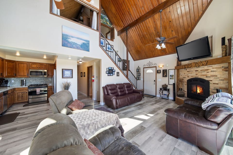 Main floor living room, stairwell, hallway and kitchen