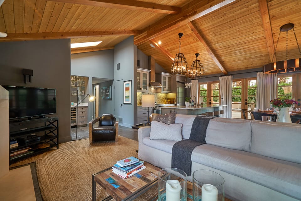 Your custom down filled sofa, soaring ceiling & professional designer elements!