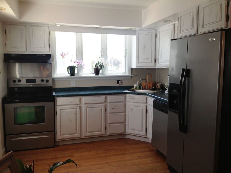 Pancakes galore with awesome kitchen, dishes, pots, pans, griddle, coffee maker!