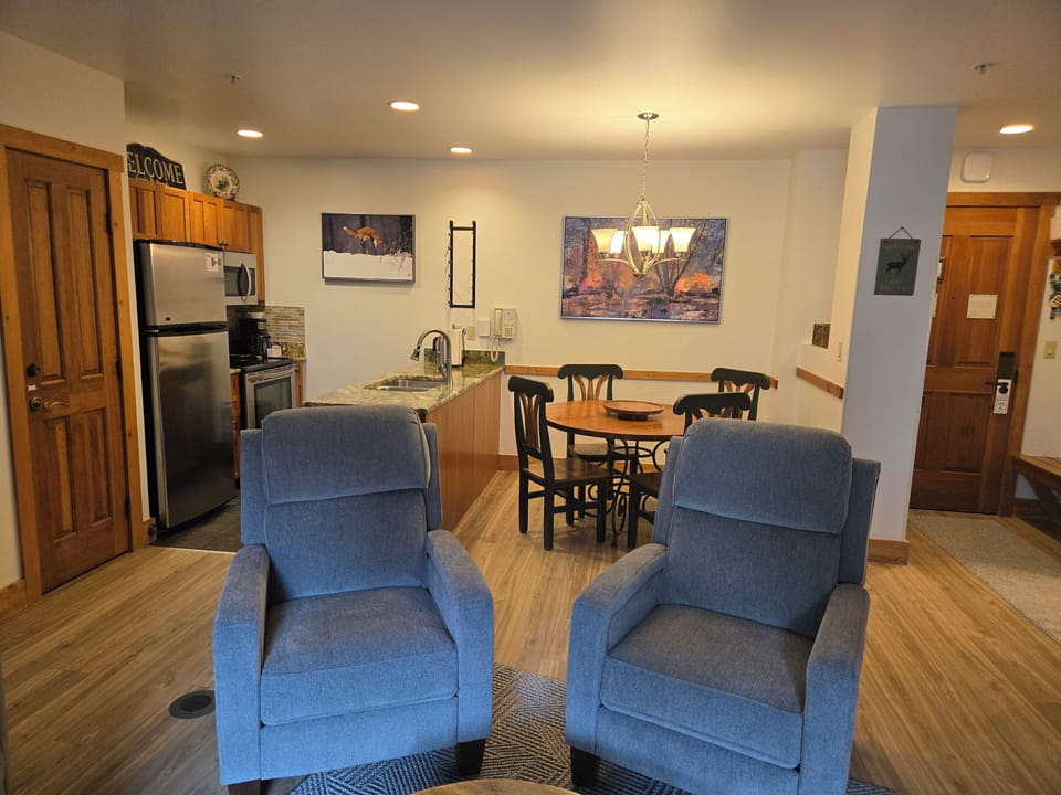 2 Recliners.  Kitchen.  Dining.  Entry.