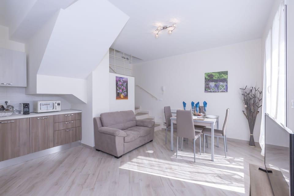 Living room with sofa and dining table