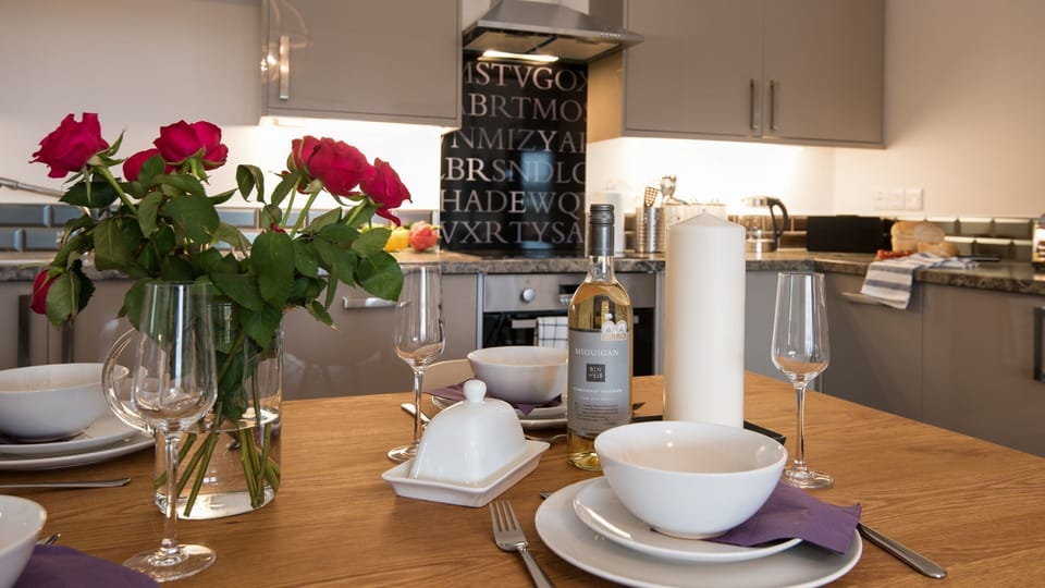 Byre - Dining table in open plan kitchen
