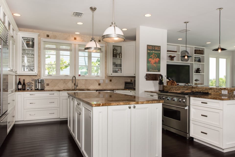Newly remodeled kitchen with granite and Viking stove and Sub Zero Fridge.